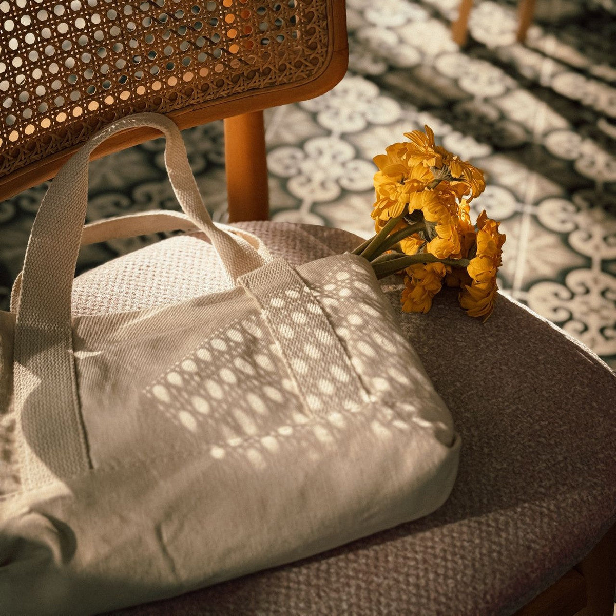 linen bag on a chair with flowers