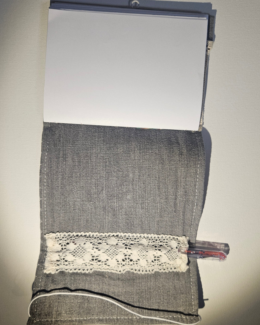grey notbook open at the back side