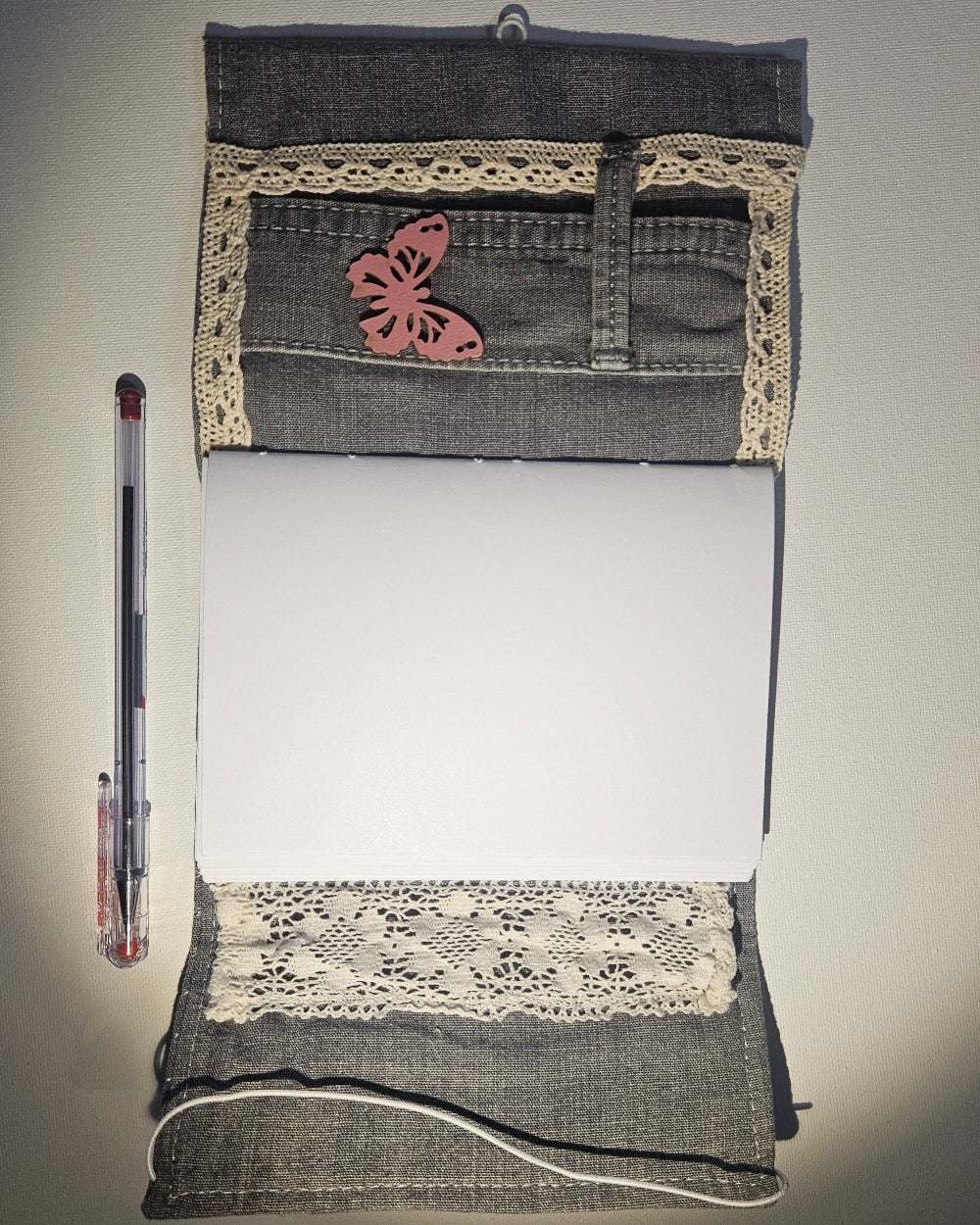 grey notbook open on front side
